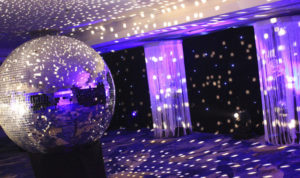 Mirror ball lighting in seventies event theme