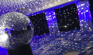 Mirror ball lighting in seventies event theme